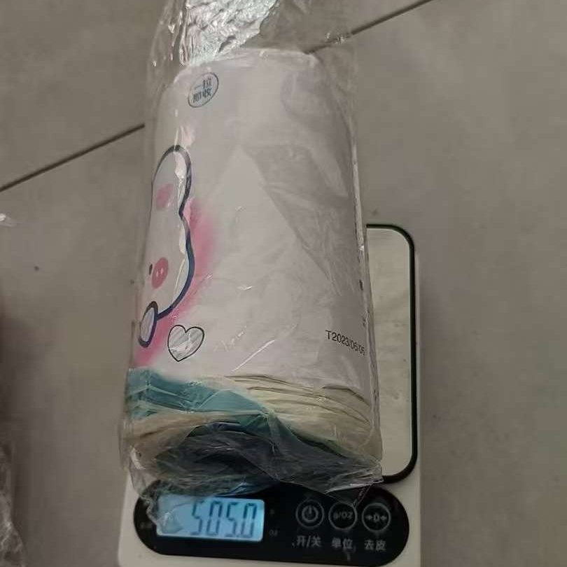 Drawstring garbage bag